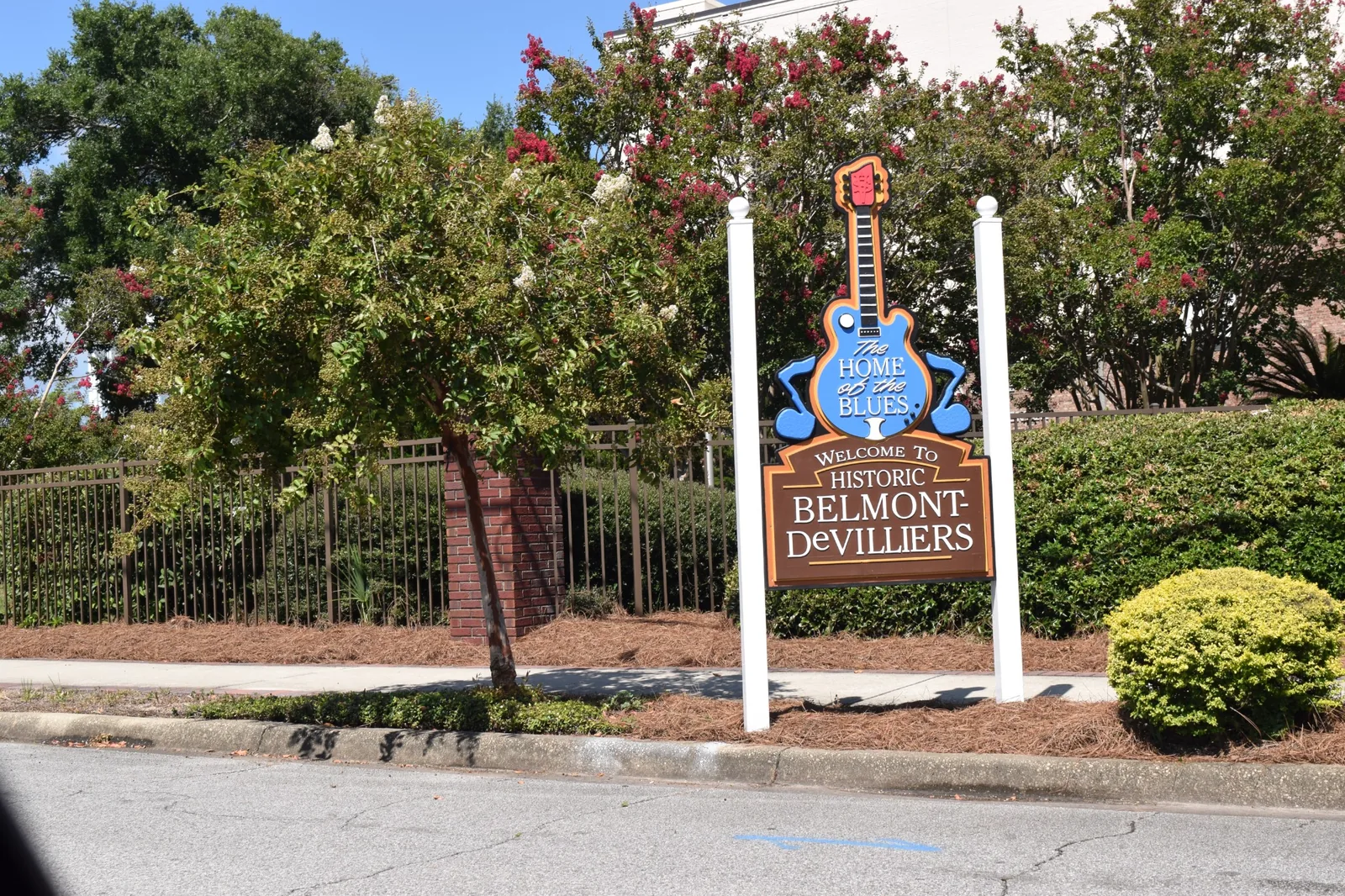 Welcome to Historic Belmont-DeVilliers, Home of the Blues sign in Pensacola