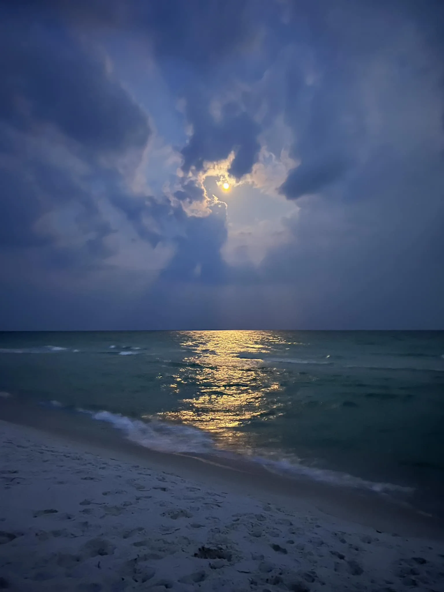 Moonrise reflecting over Gulf waters near Gulf Breeze