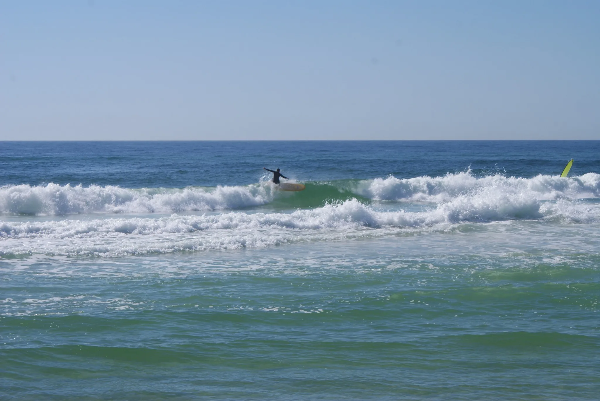 Surfing in the Gulf at Navarre Beach