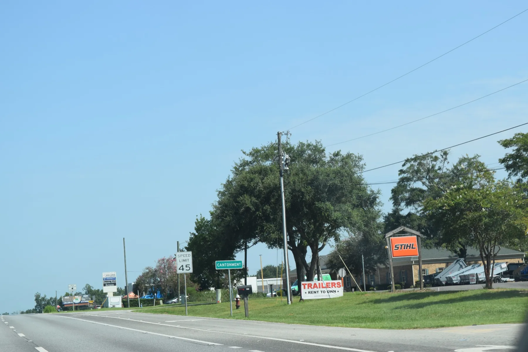 Cantonment community sign along a North Escambia roadway