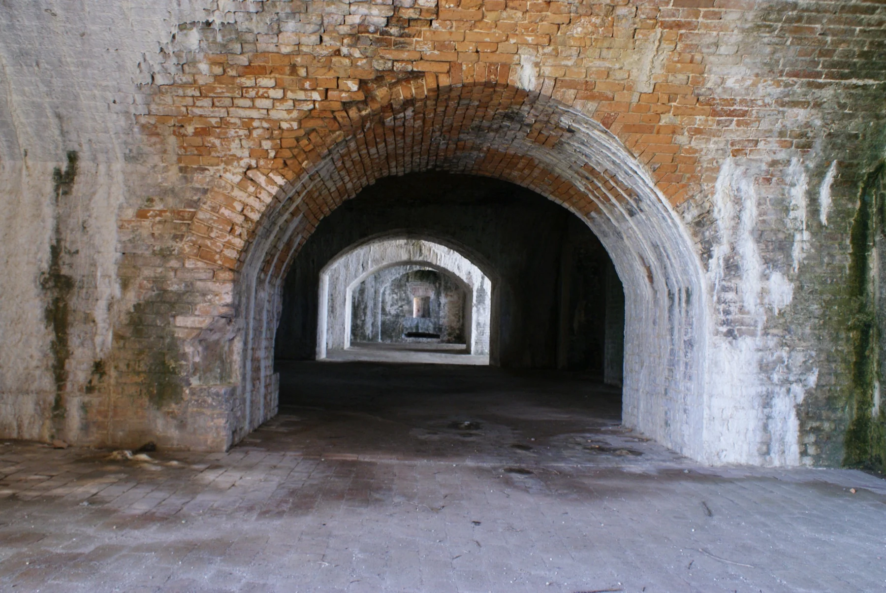 Repeating brick arches inside Fort Pickens