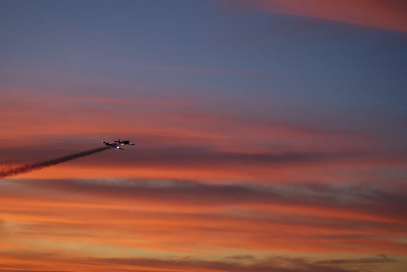 Aircraft crossing a Pensacola sunset near Warrington